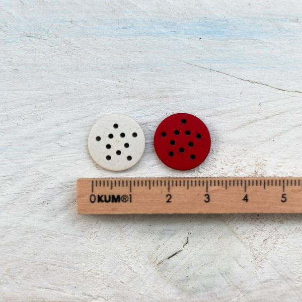 Sternknopf aus rotem Kunstharz, 15 mm